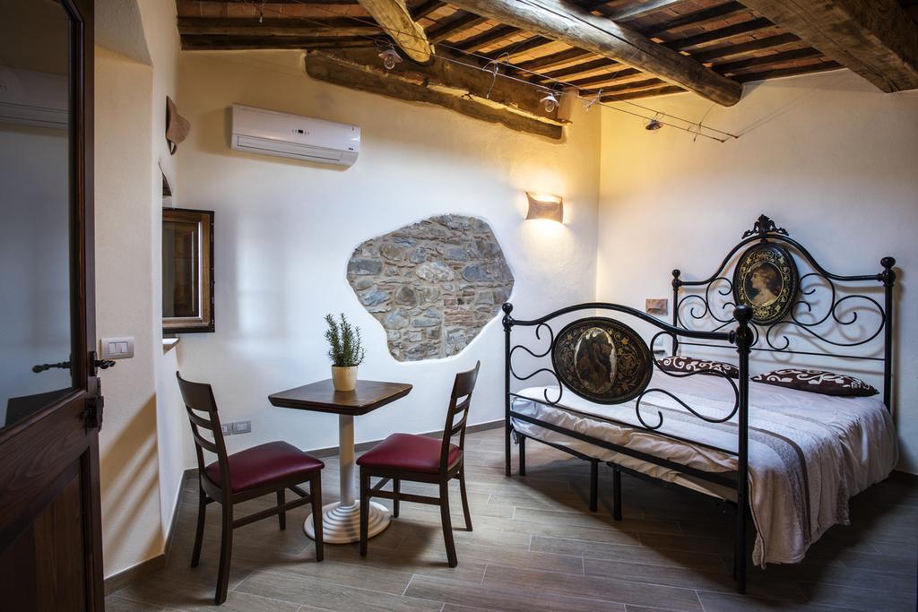 Bed and breakfast Antico Borgo Seggiano Chambre photo