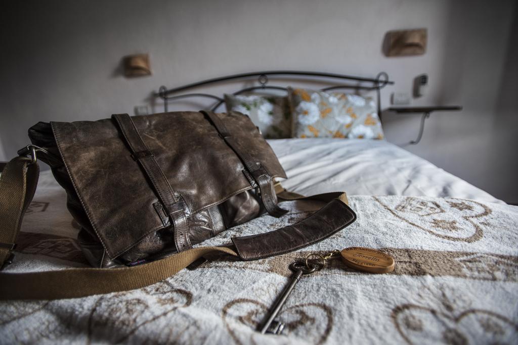 Bed and breakfast Antico Borgo Seggiano Chambre photo